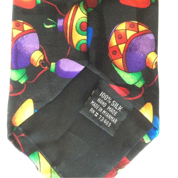 Addiction Necktie Christmas Ornaments and Lights Black background. - Picture 2 of 4